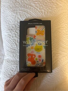 Emma Chamberlain 
X Wildflower iPhone 12/12 Pro Case